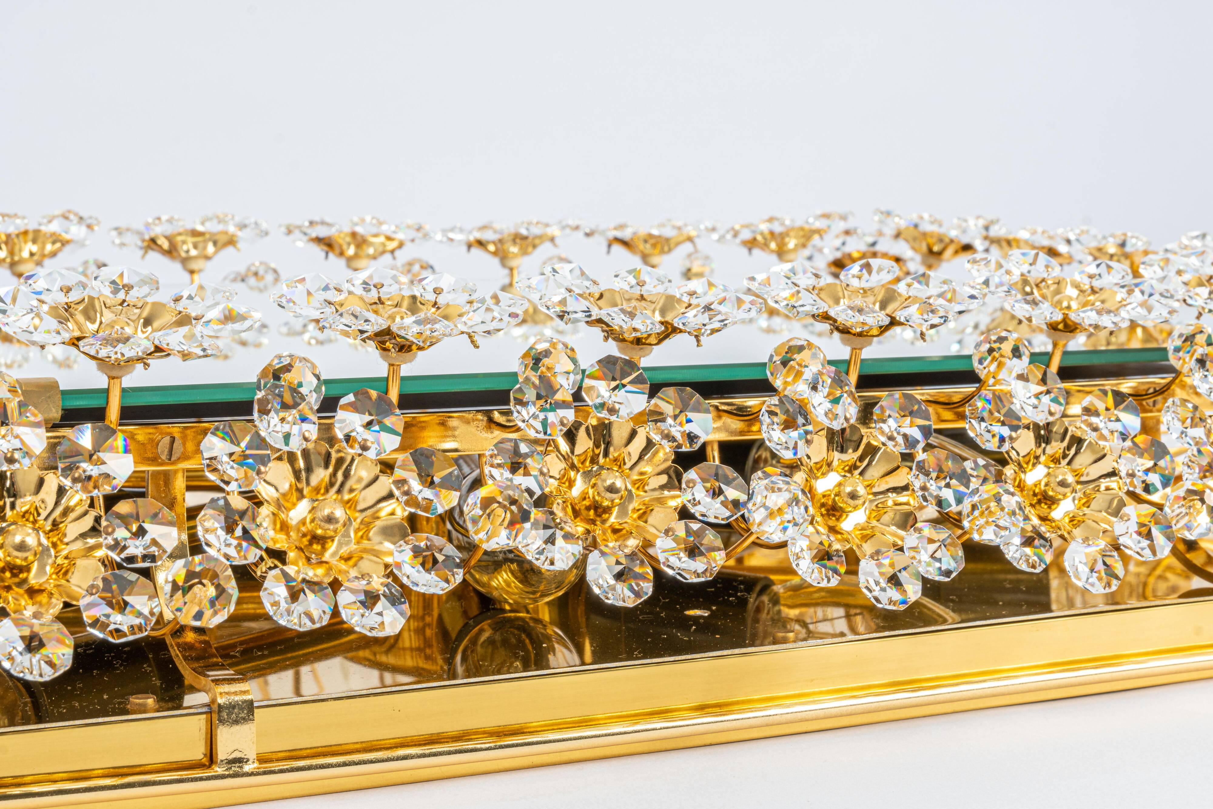 Spectacular backlit mirror in gilded brass and crystal glass by Palwa, Germany.