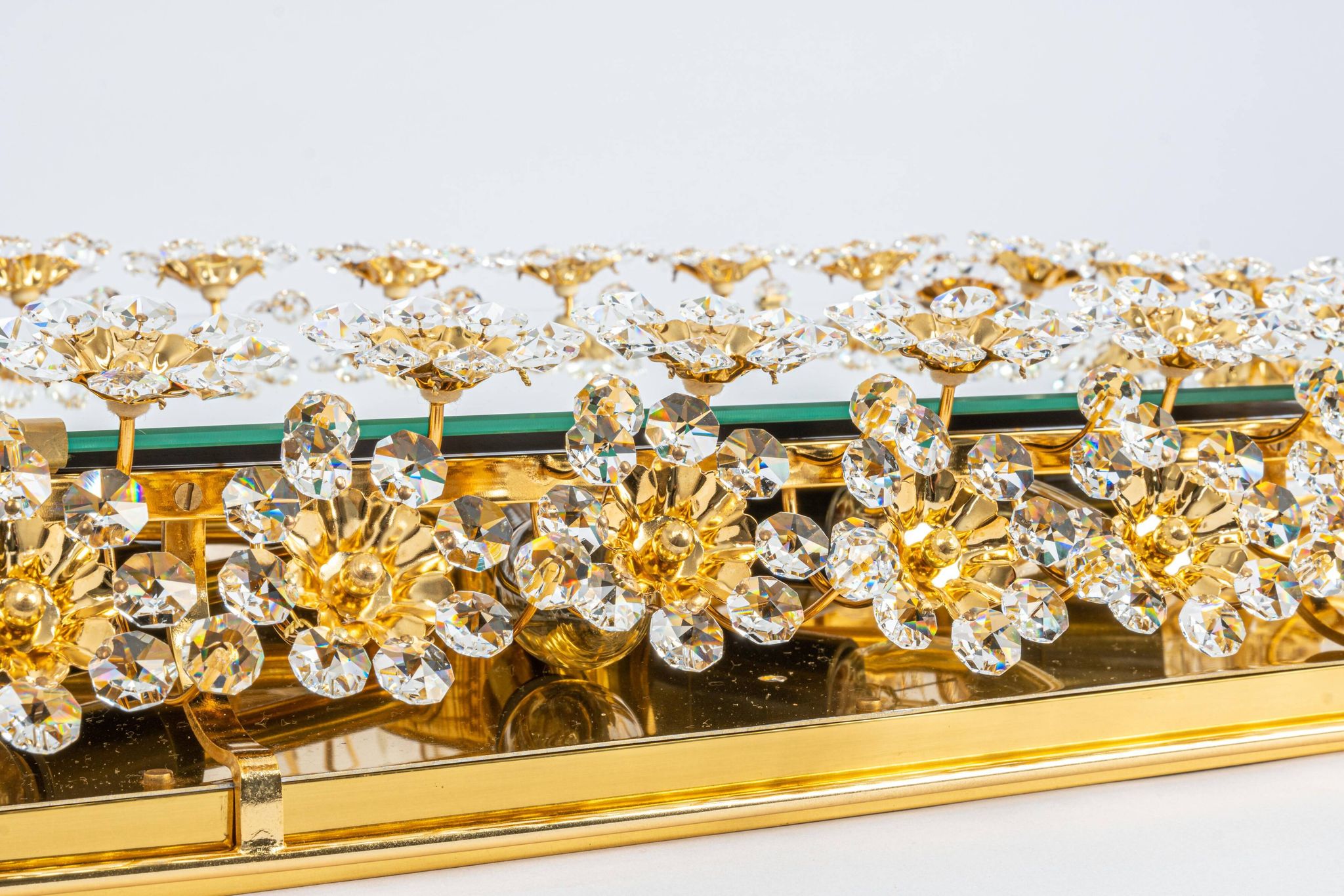 Spectacular backlit mirror in gilded brass and crystal glass by Palwa, Germany.