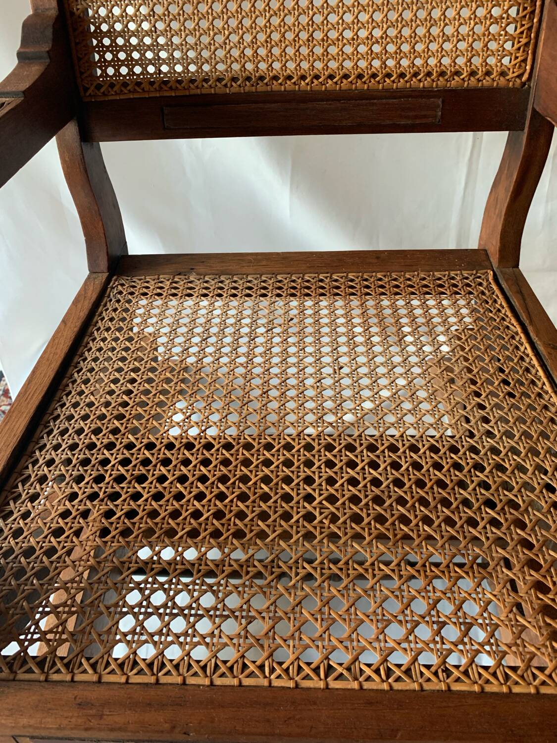 Cane armchair