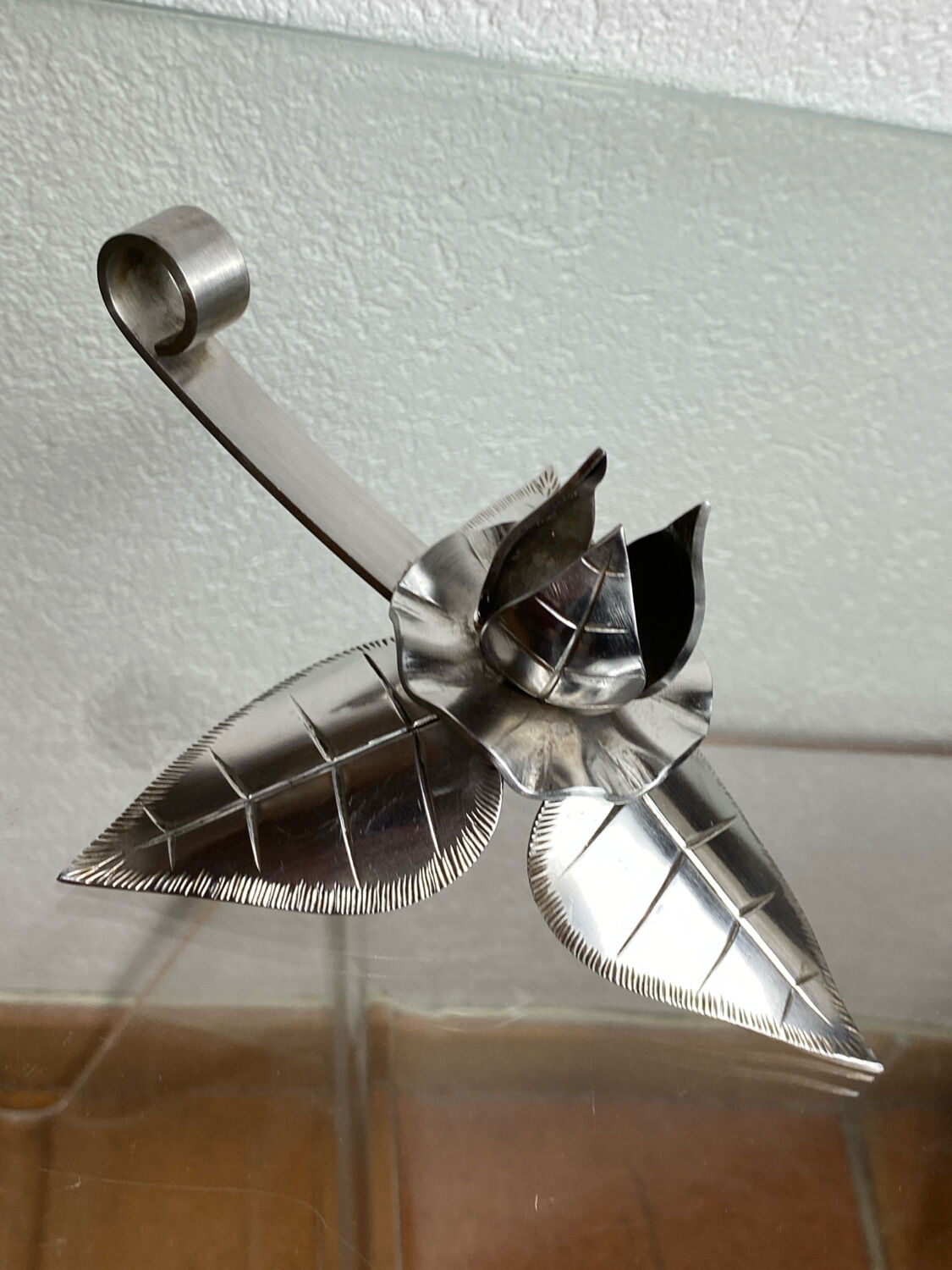 Silver-plated metal flower candle holder