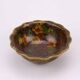 Vintage Asian brass bowl with floral decoration.