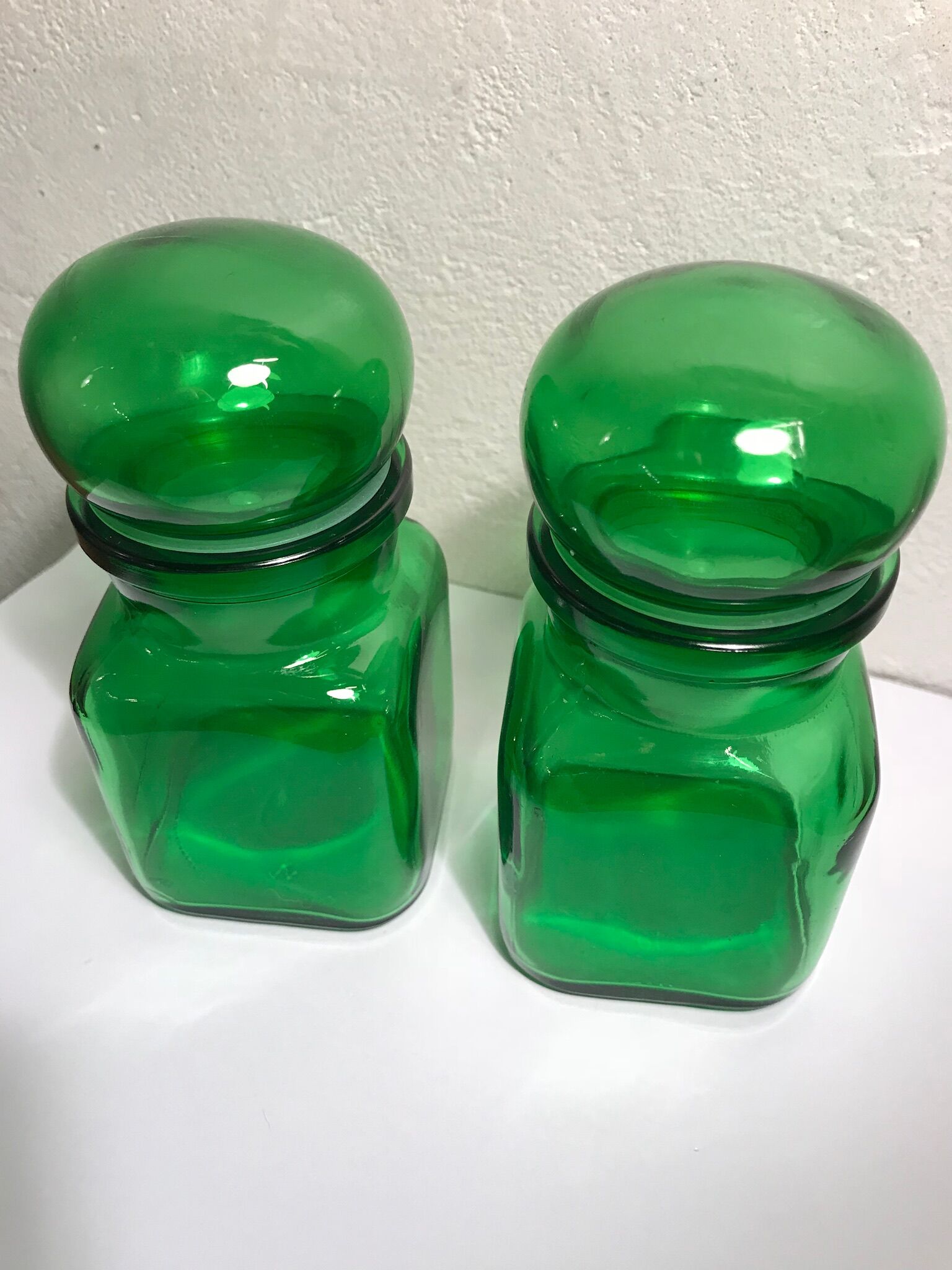Green glass pharmacy jars