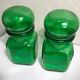 Green glass pharmacy jars