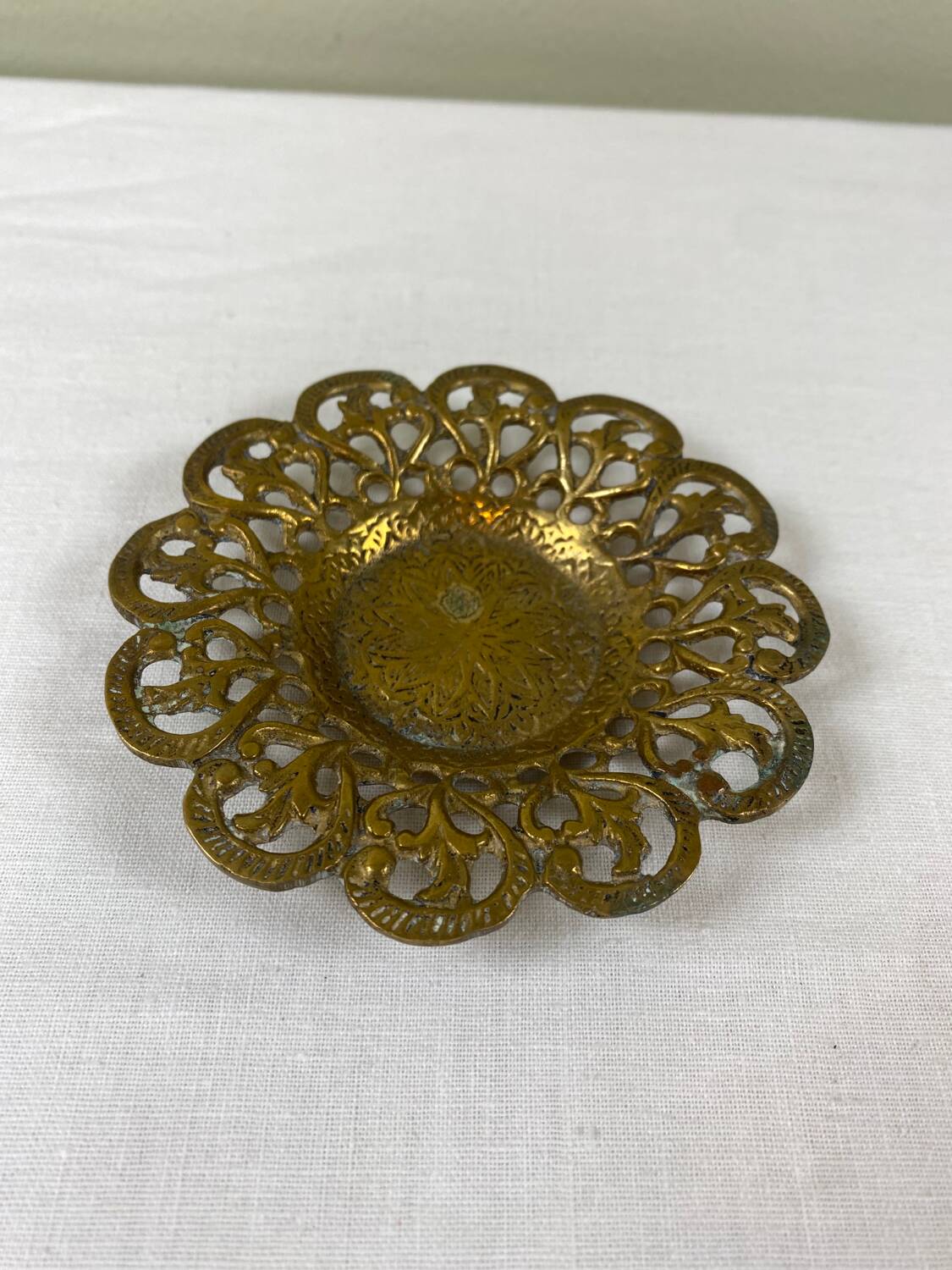 Brass pocket emptier