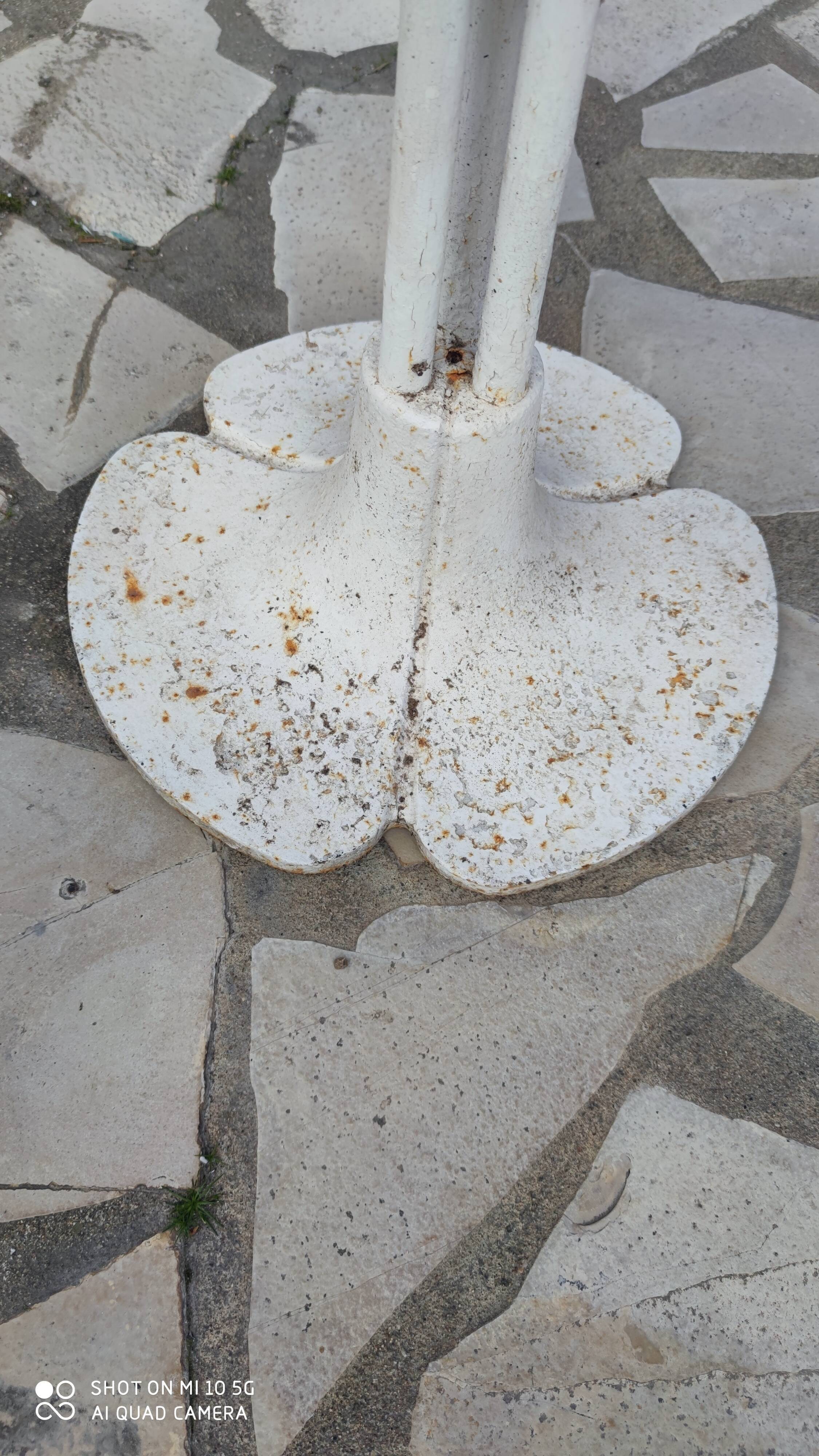 Garden or bistro table with steel and fiberglass base and top, circa 1970