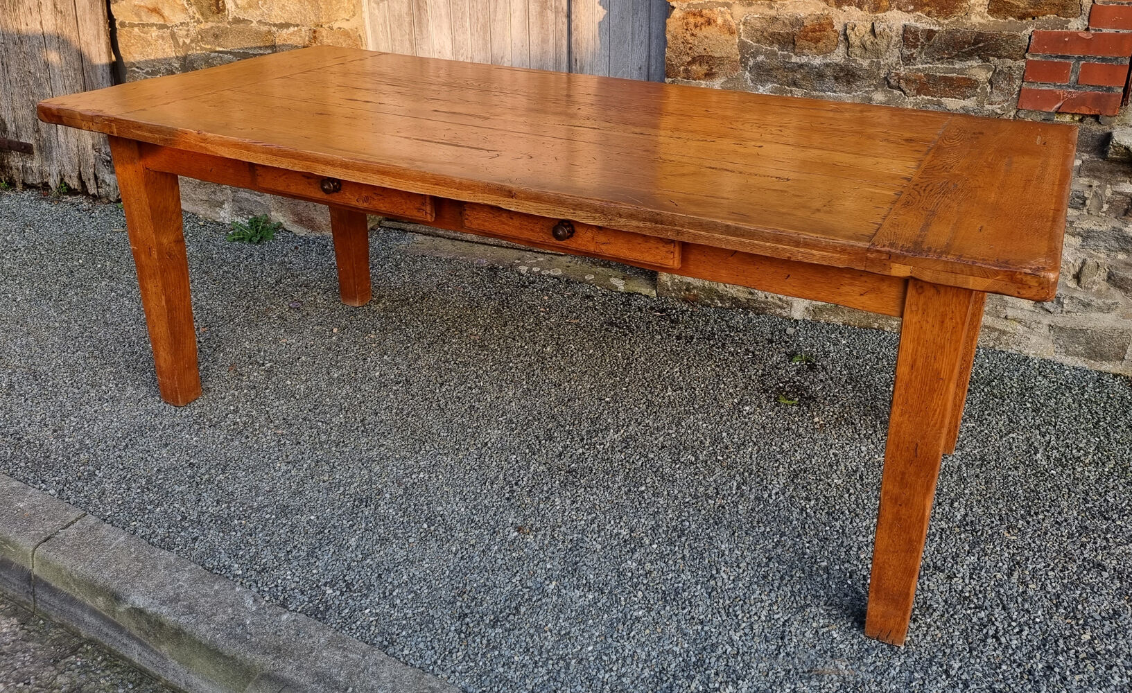 Solid oak farmhouse table, two drawers, vintage, early twentieth century.