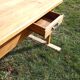 Old rustic farmhouse table made of solid wood.