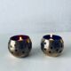 Pair of brass and glass tealight holders