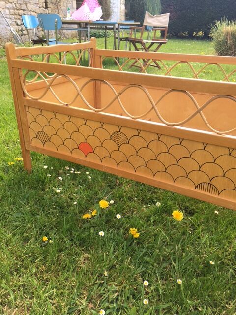 Wood and rattan baby bed
