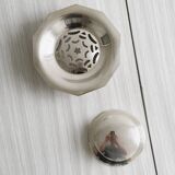 Antique butter dish in shiny metal
