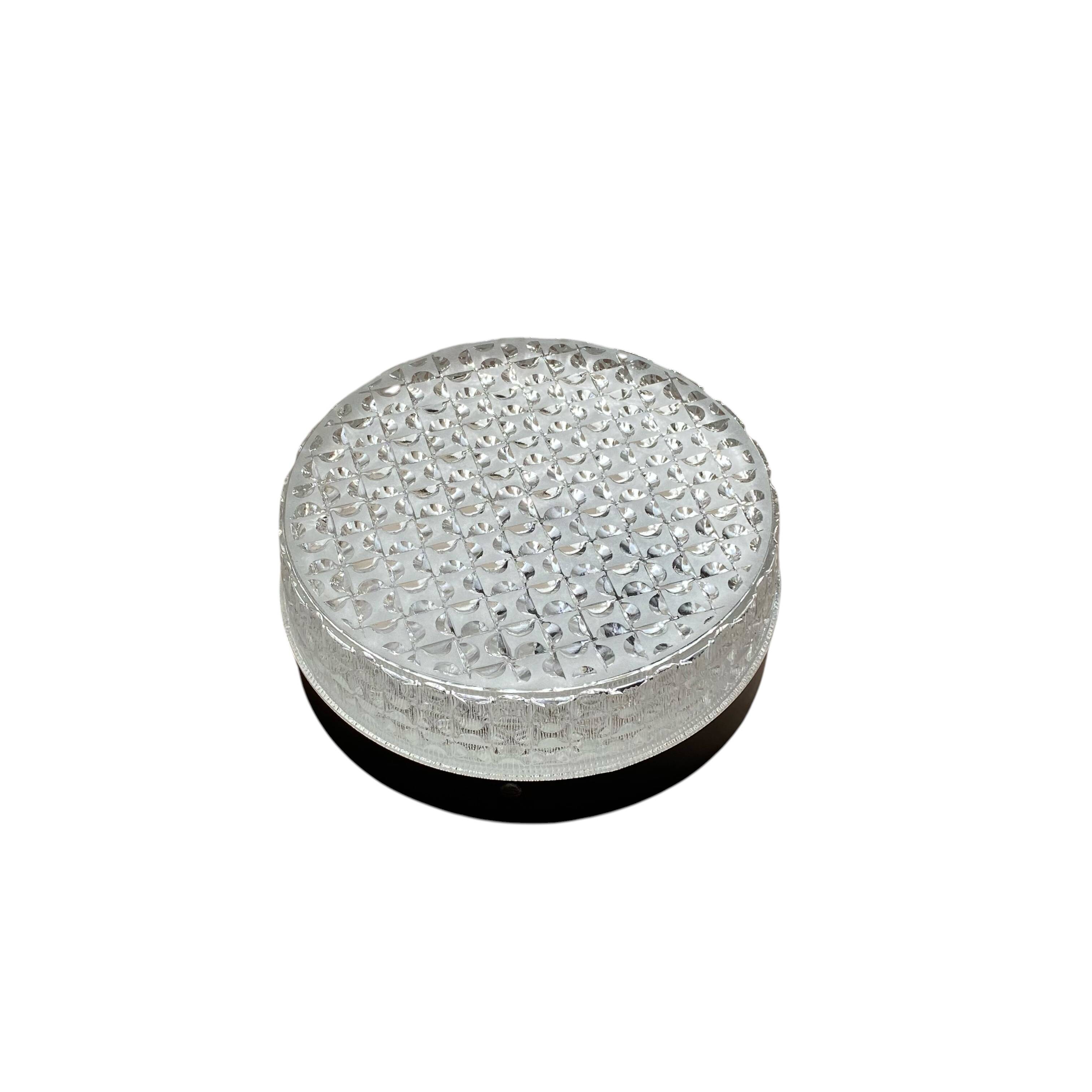 Round wall light or ceiling light with transparent glass from the 1970s.
