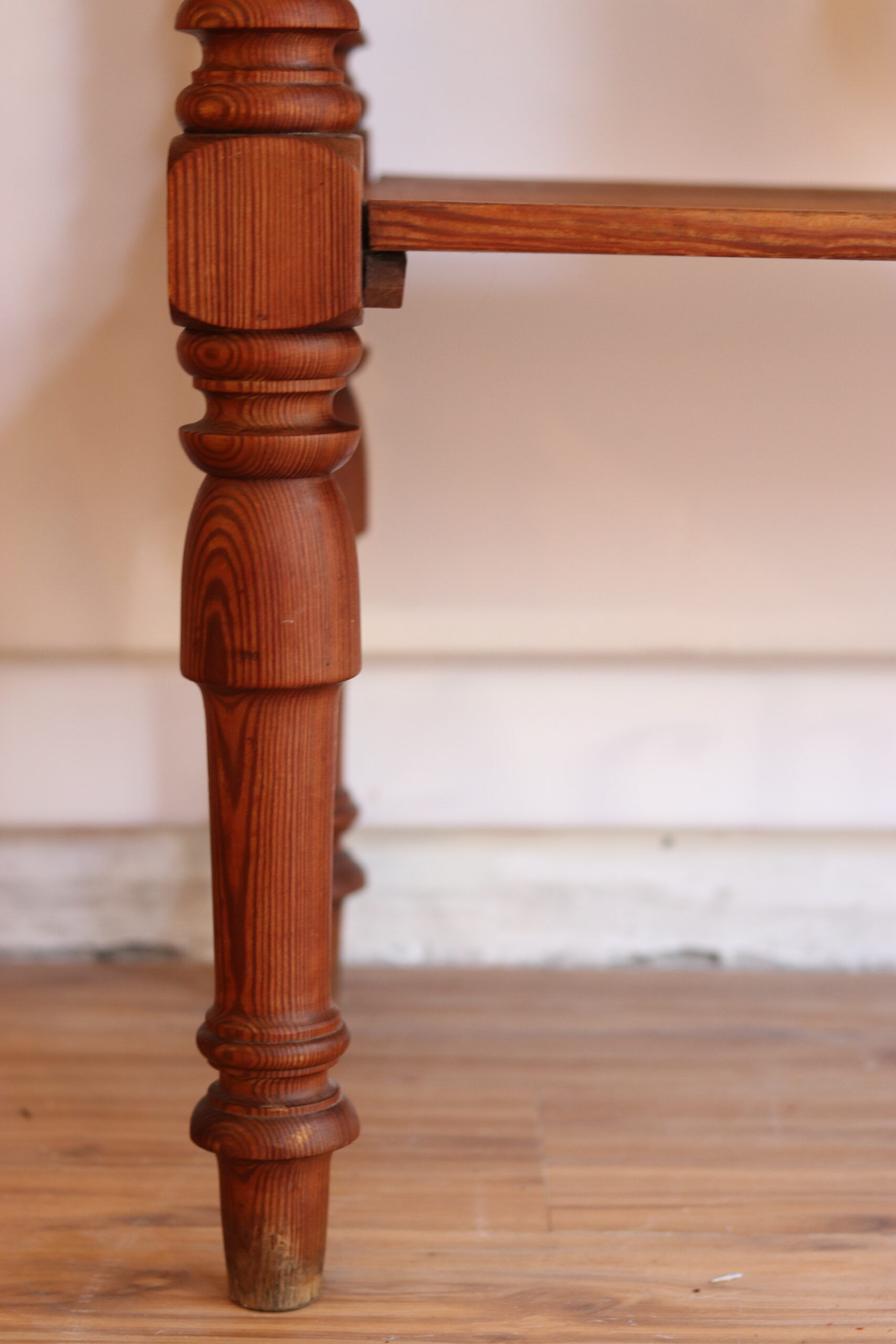 Large console or shop sideboard in pitch pine, early 20th century.