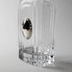 Vintage glass decanter from the 1980s, transparent glass with a silver plate and spherical stopper.