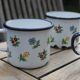 Enamelled sheet metal cups