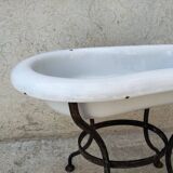 Antique bidet in enamelled sheet metal with wrought iron support