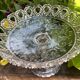 Glass fruit bowl, pressed mould, centre table, seasonal fruits.