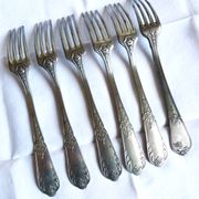 Art Deco cutlery, spoons, forks and table knives.