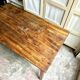 Table de ferme en bois foncé 1 tiroir