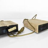 Pair of solid travertine table lamps with incised decoration, French production.