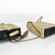 Pair of solid travertine table lamps with incised decoration, French production.