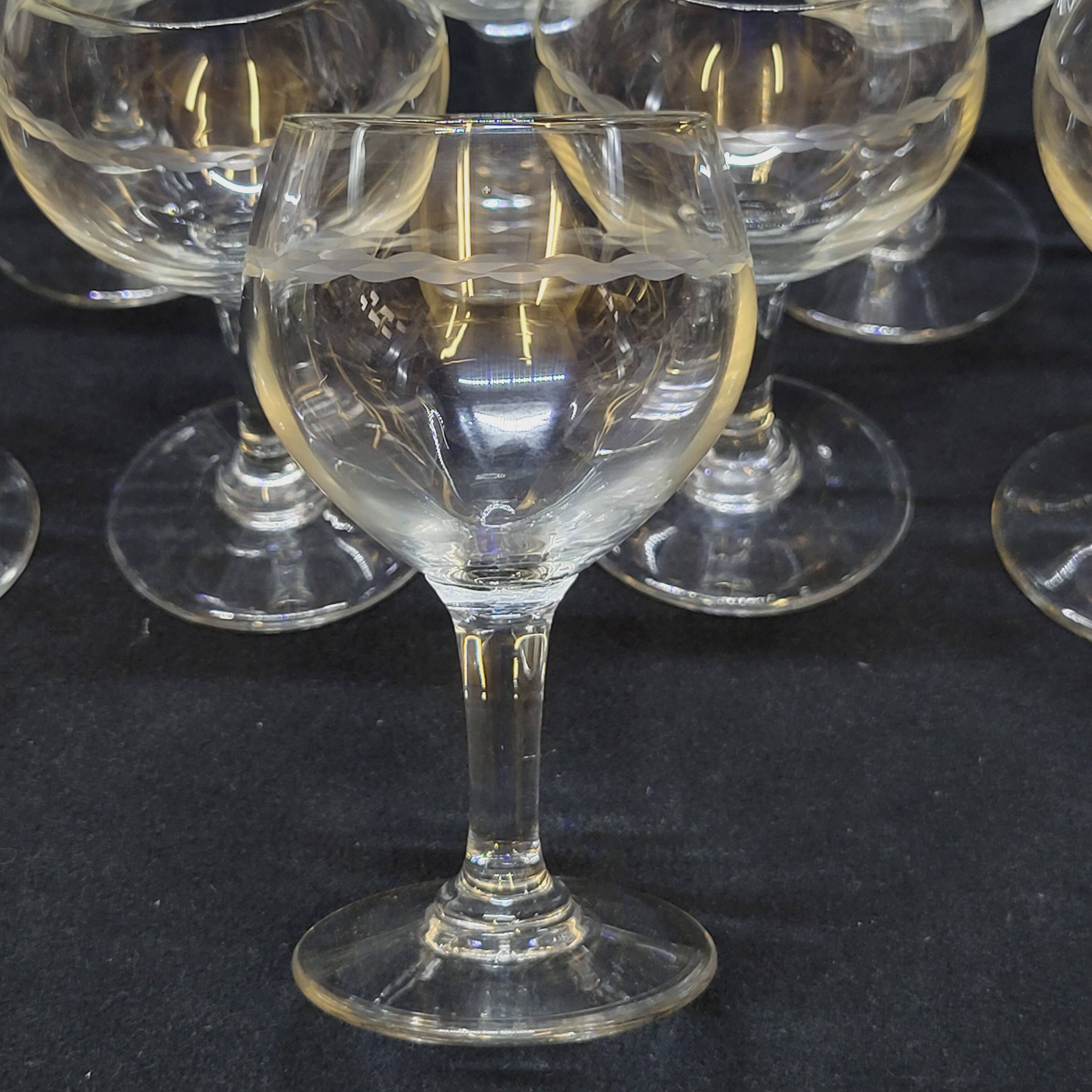 8 wine glasses in chiseled cut glass