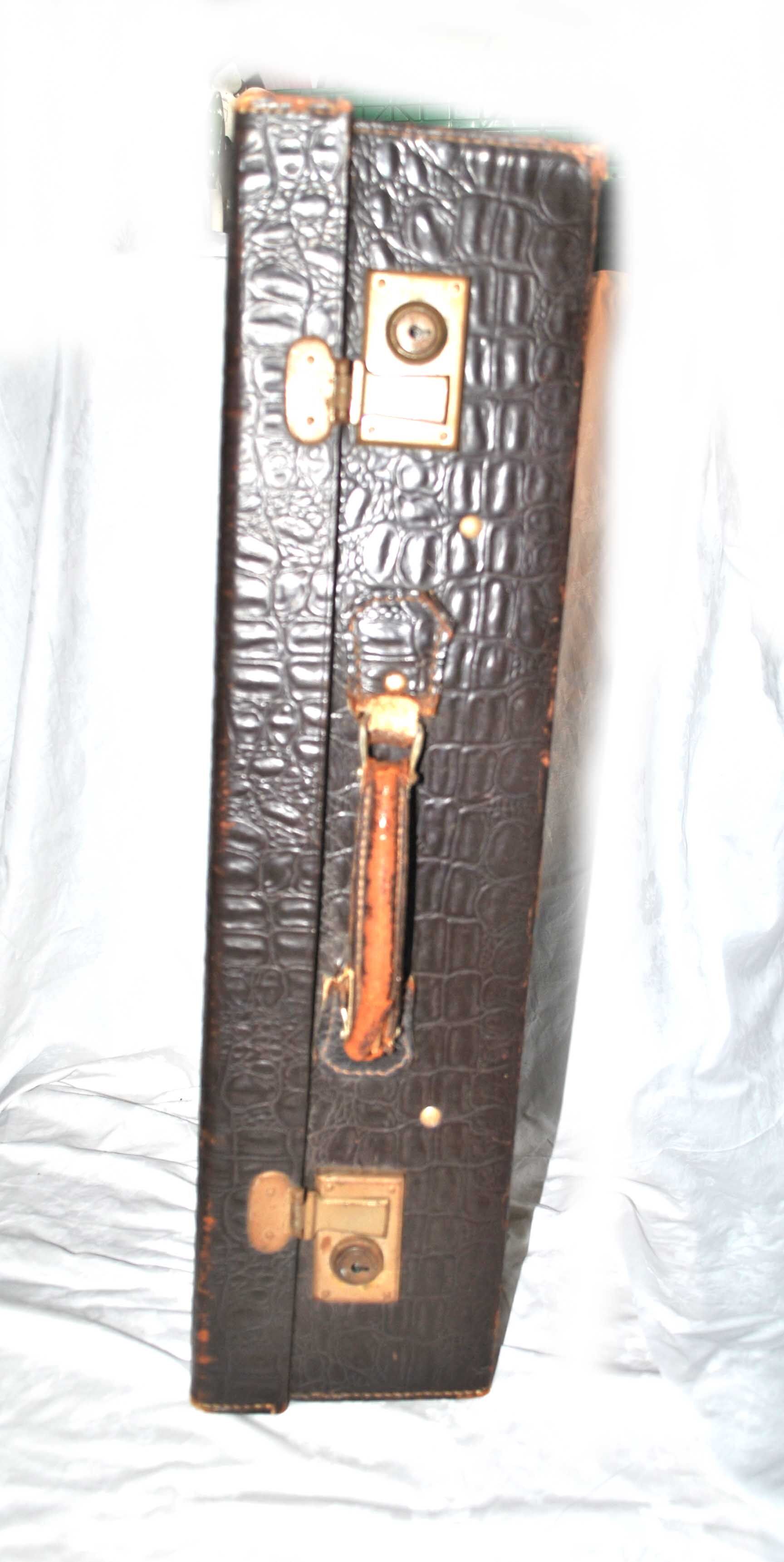 Vintage brown leather suitcase