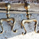 Old brass chenets foot in cabriole
