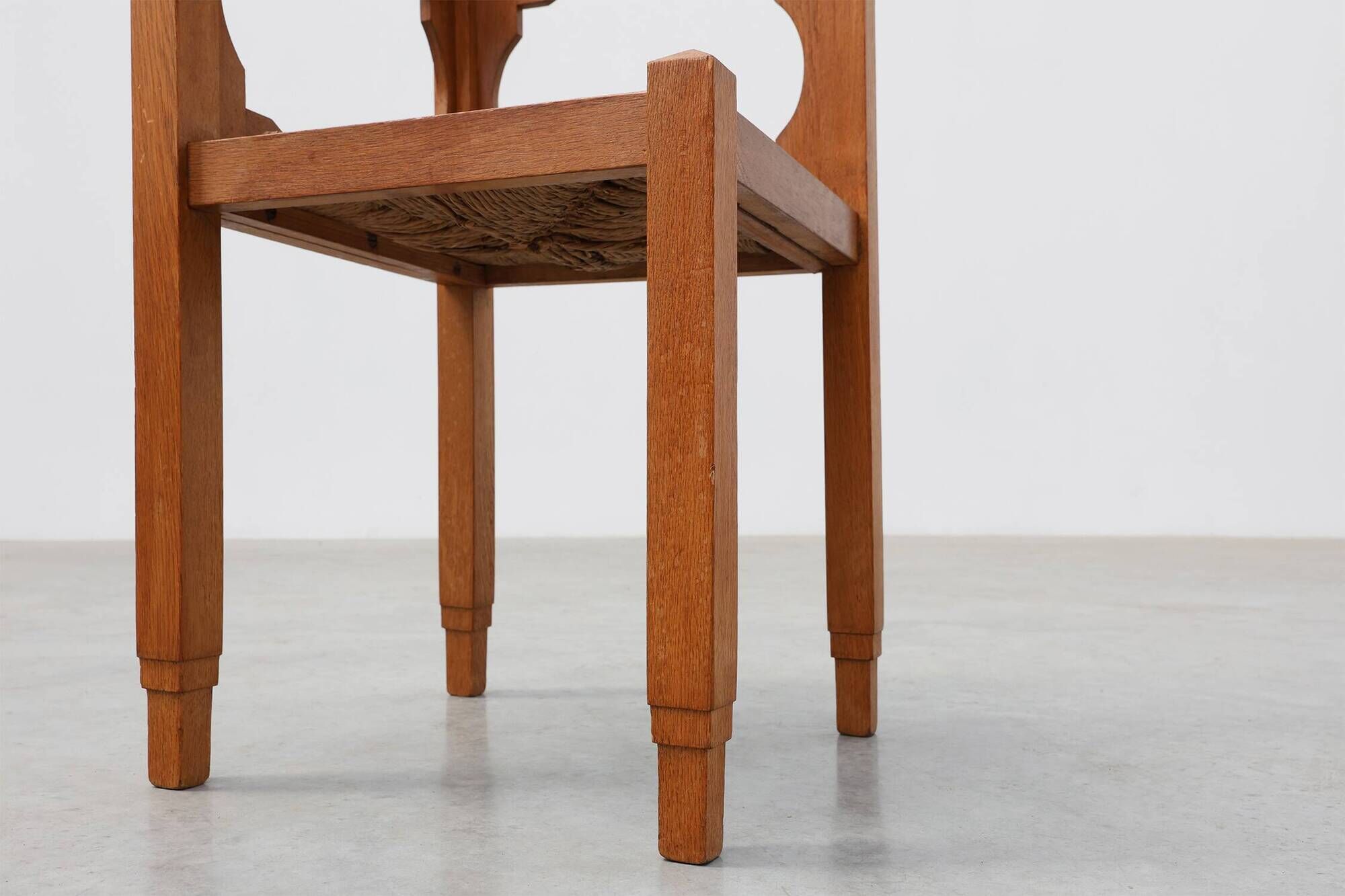 Art Deco Oak Corner Chair with Cut‑Out Backrest and Rush Seat, Belgium, cir