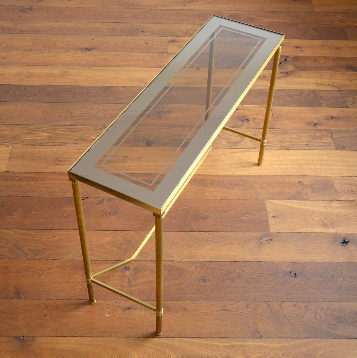 Gilded console and glass 1970s