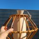 Vintage rattan and bamboo pendant light with removable shade.