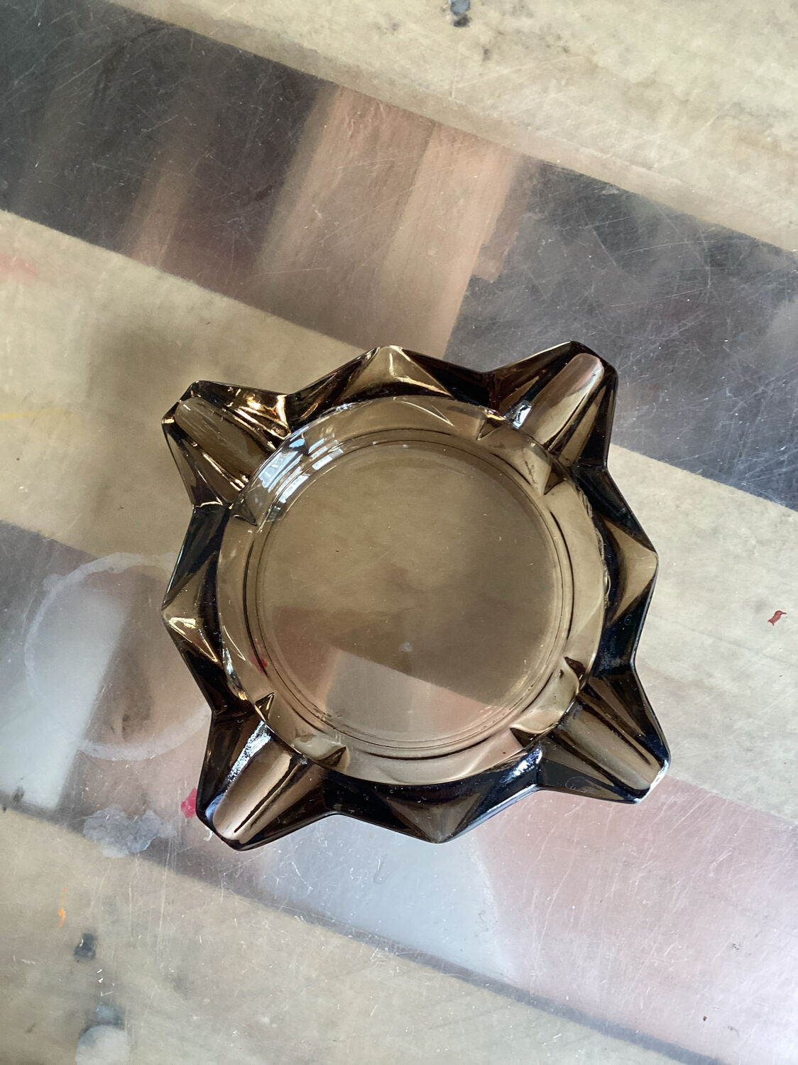 Empty ashtray vintage smoked glass pocket