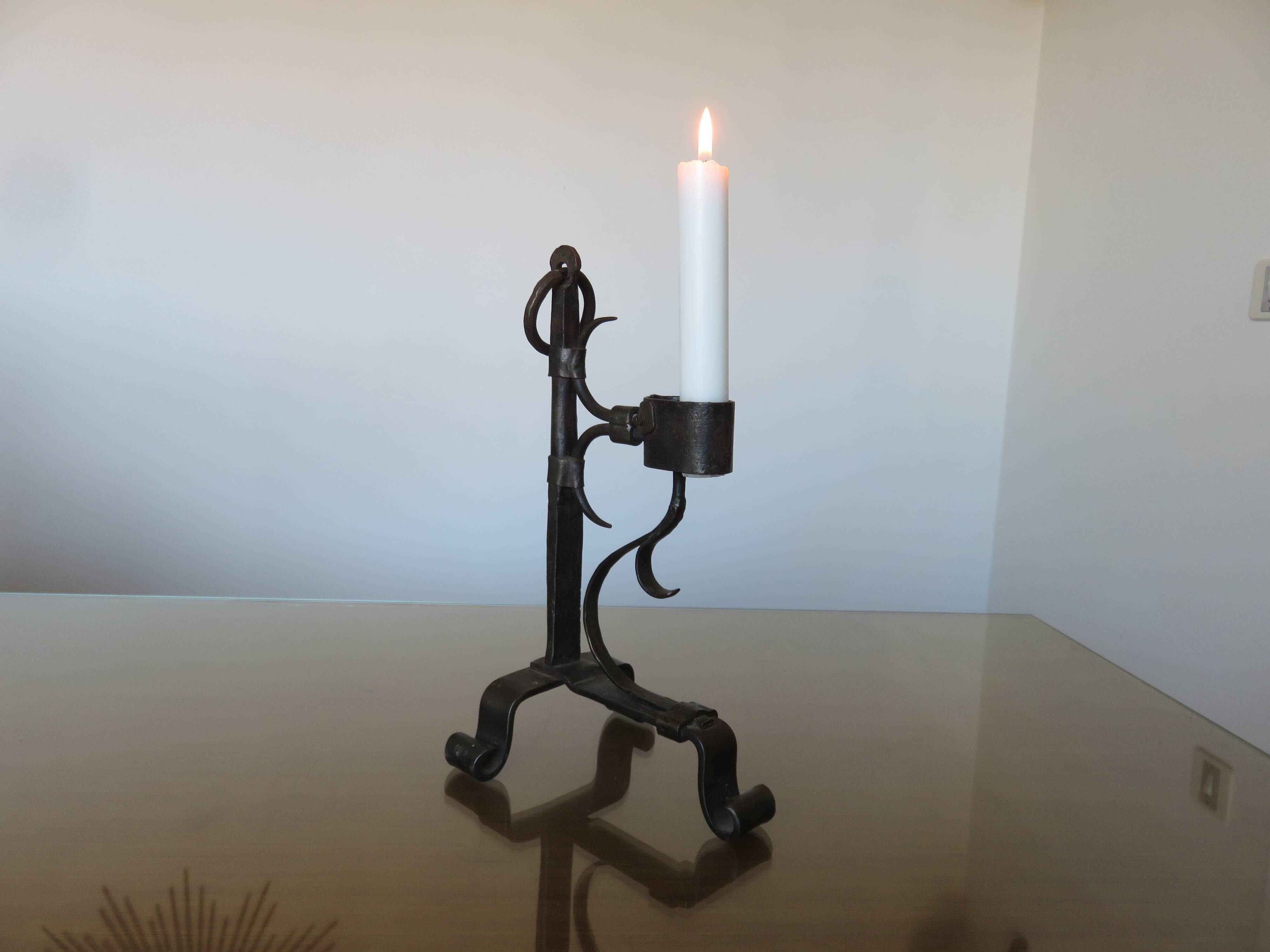 Brutalist candlestick in blackened wrought iron from the 1940s-50s.