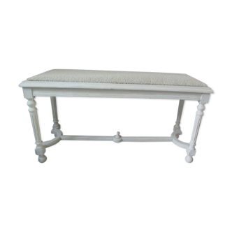 Bench upholstered with cream curl fabric