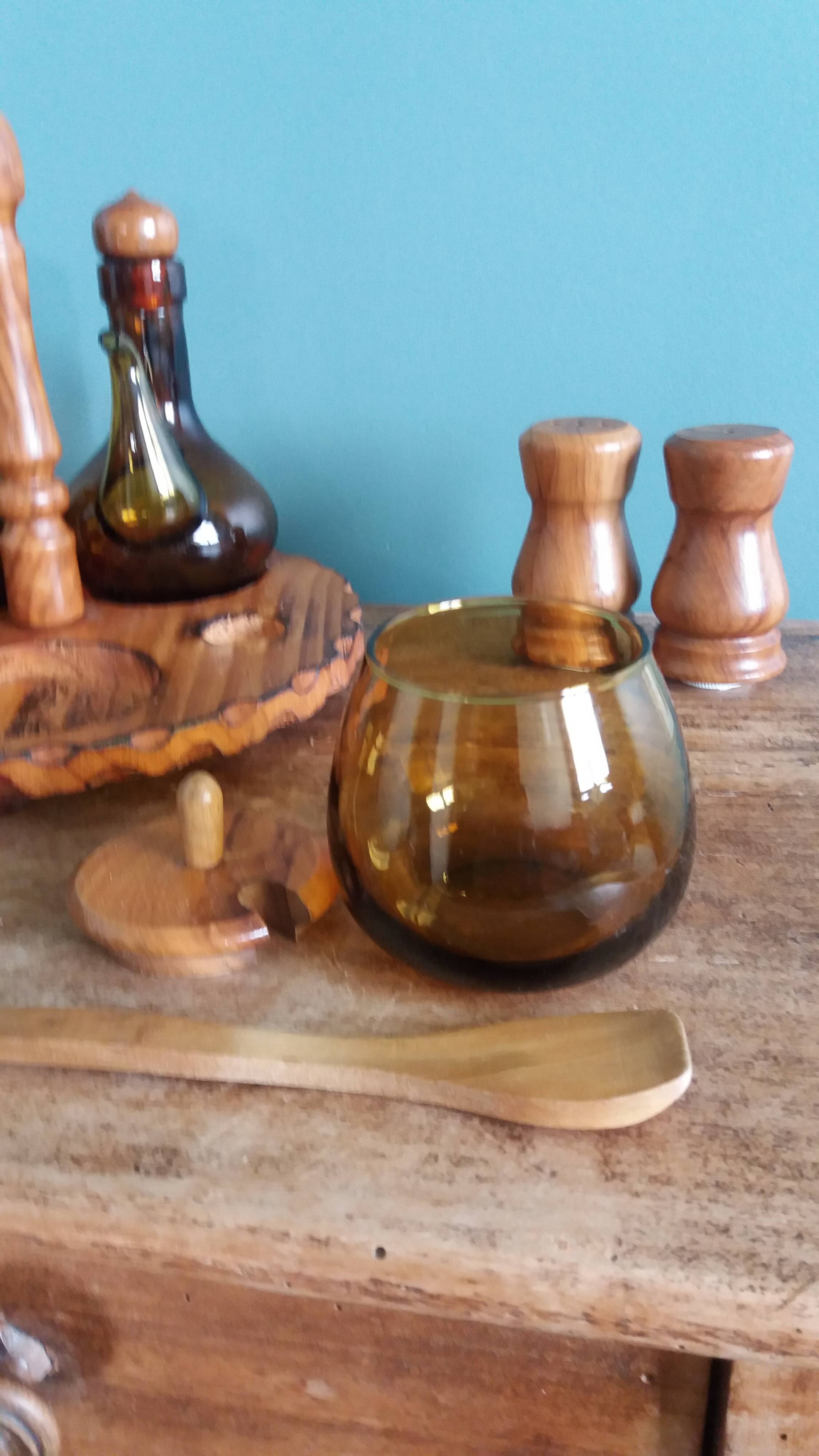 Oil, vinegar, mustard, pepper, salt, olive wood servant from Spain.