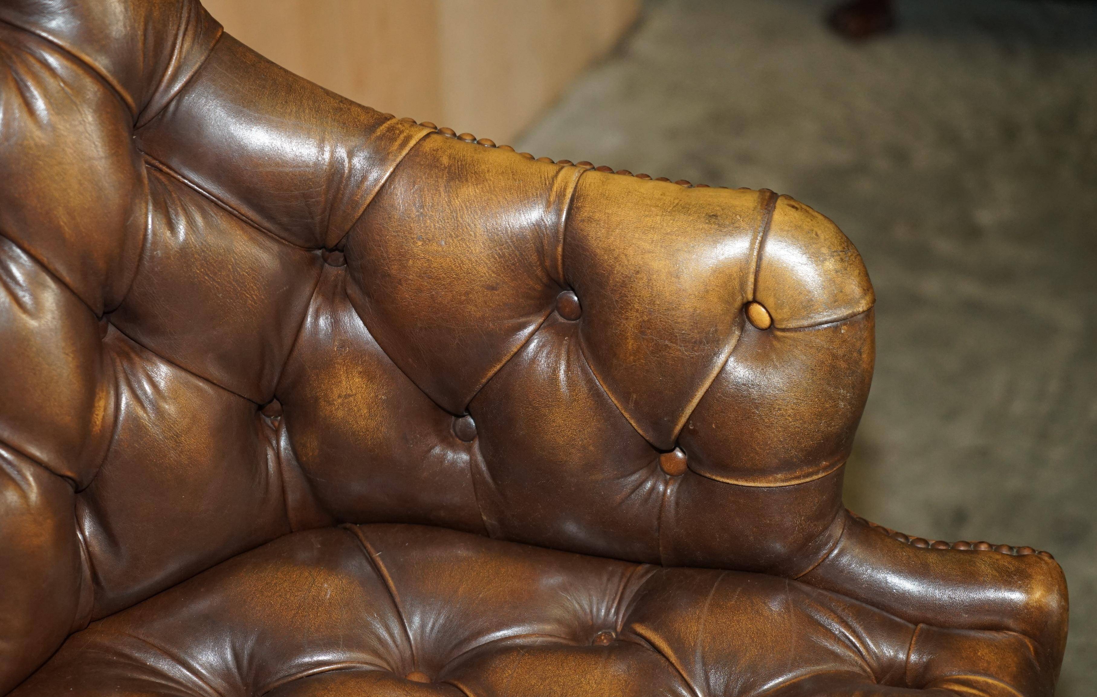 Fauteuil Chesterfield vintage en cuir vieilli