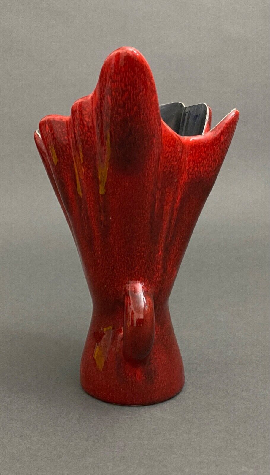 Free form red ceramic vase 1960 by J.L. or J.C.