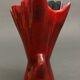 Free form red ceramic vase 1960 by J.L. or J.C.