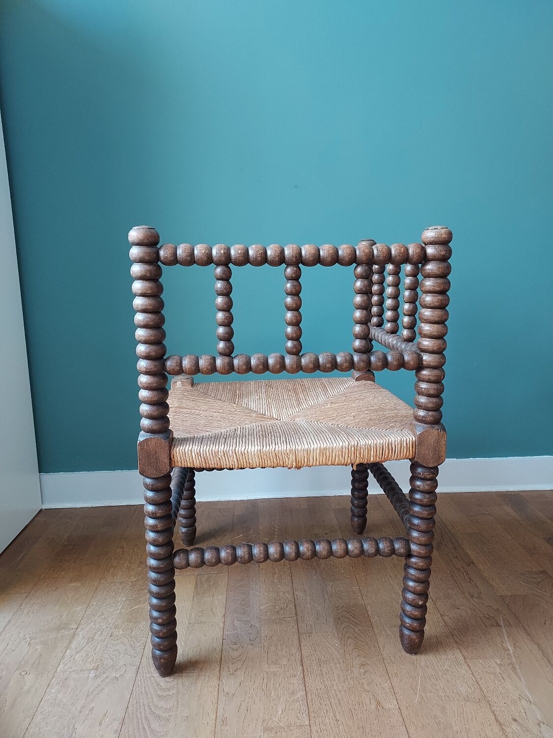 Corner armchair in turned wood