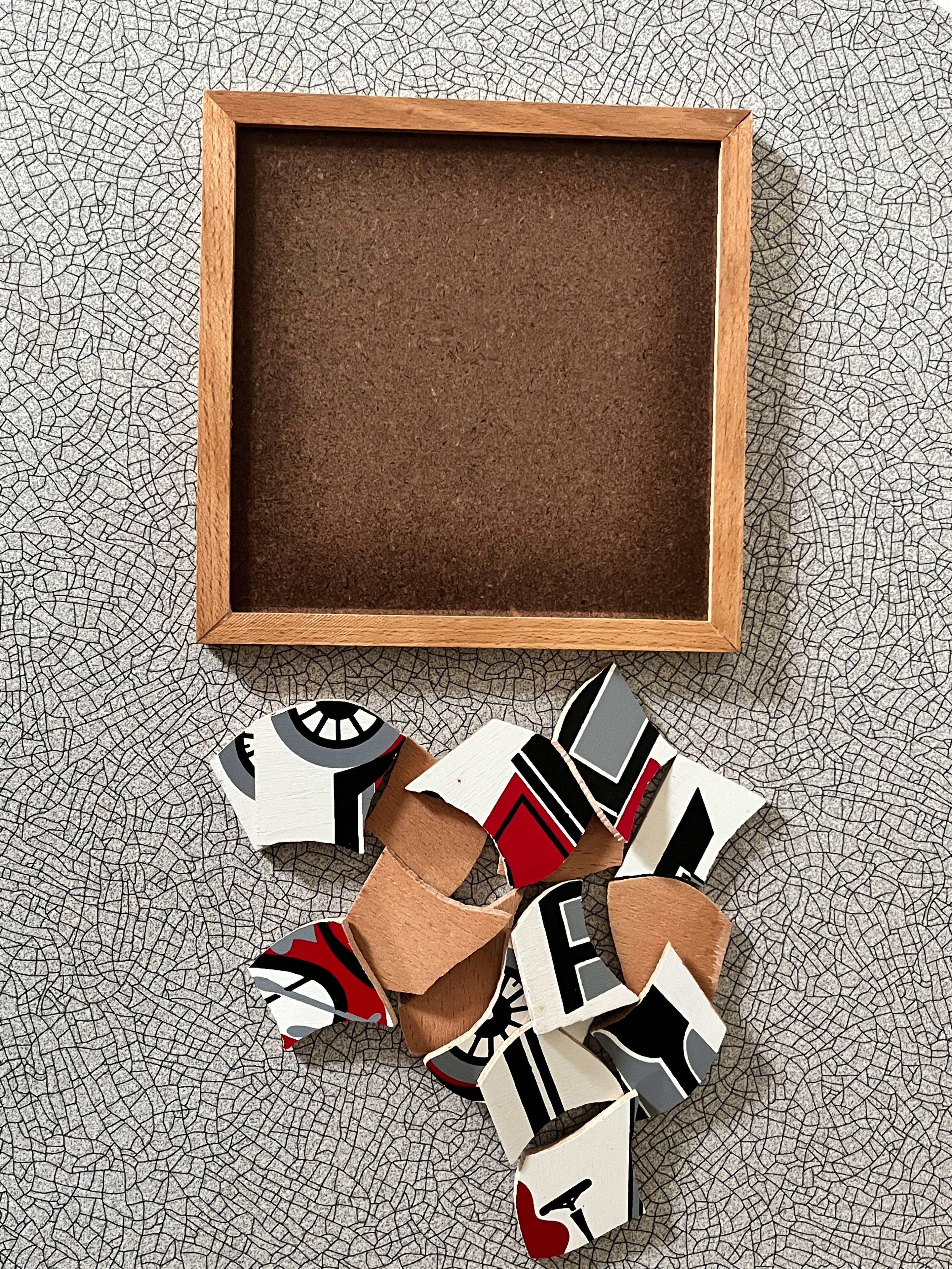 Wooden frame puzzle from the 60s/70s depicting a vintage car.