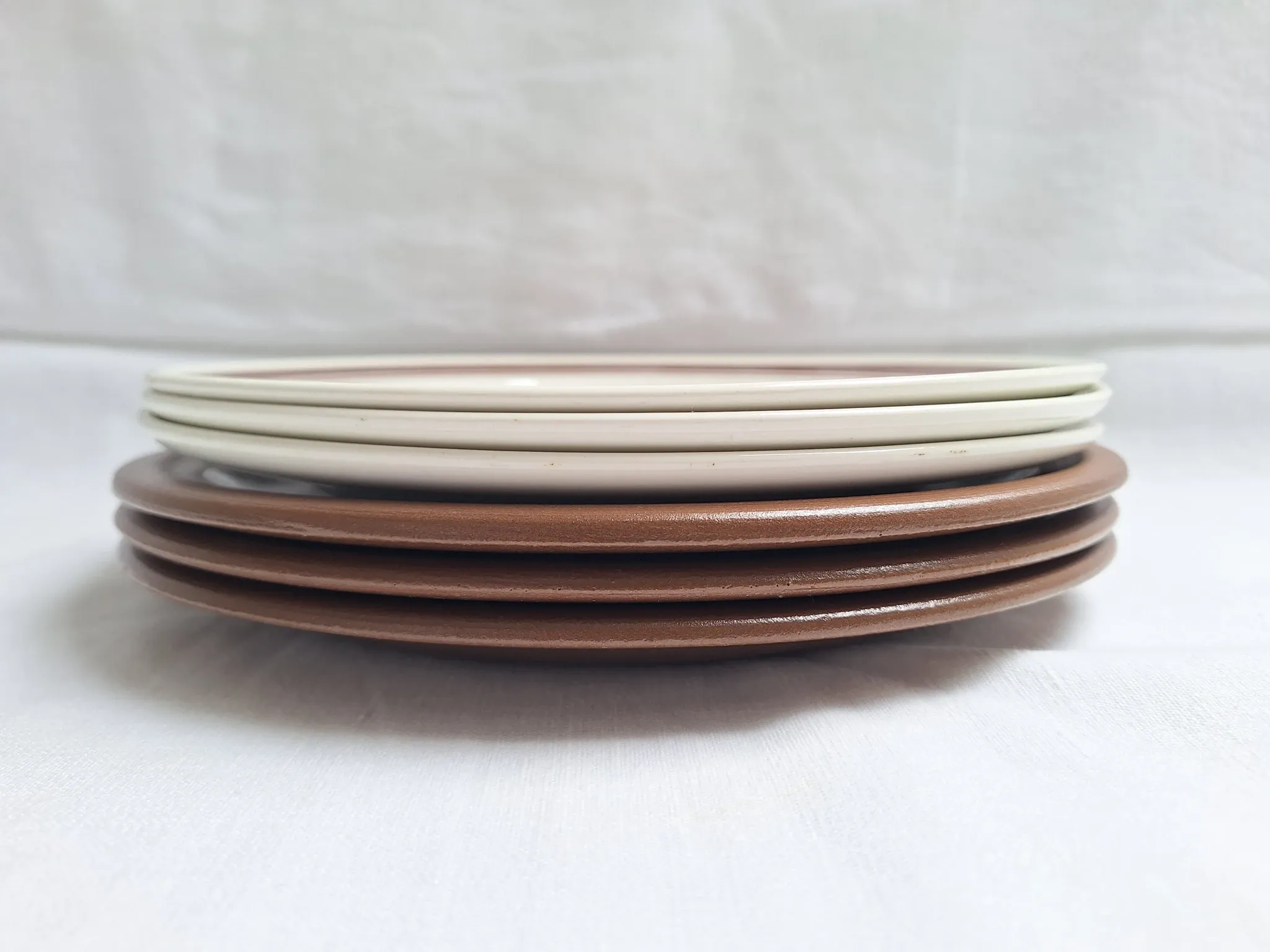 Brown flower-patterned plates from the 1970s.