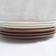 Brown flower-patterned plates from the 1970s.