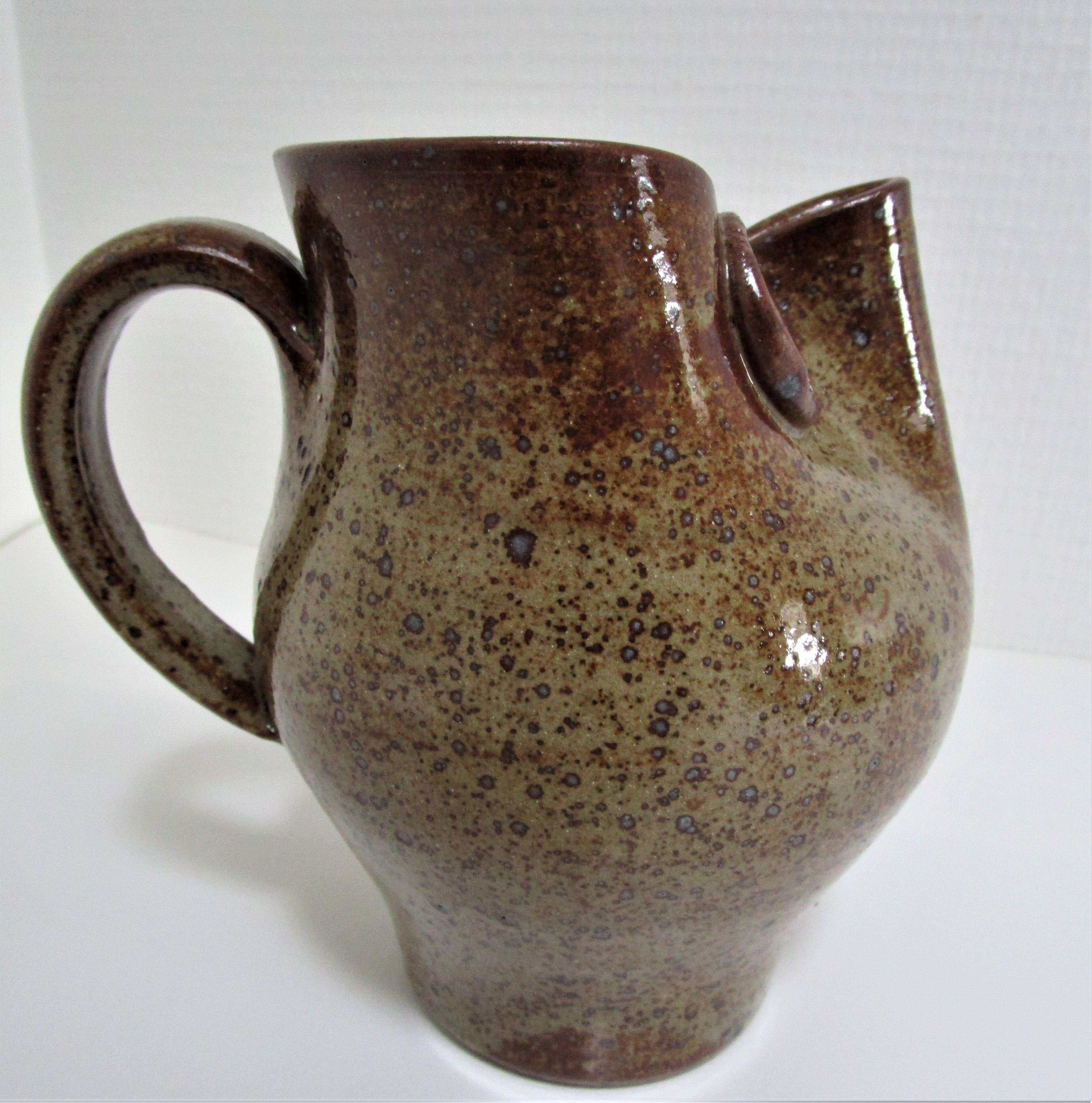 Vintage zoomorphic sandstone pitcher