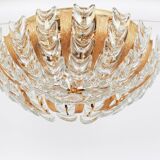 Delicate chandelier in gilded brass and crystal glass in the shape of flowers by Palwa, Germany, 1970s.