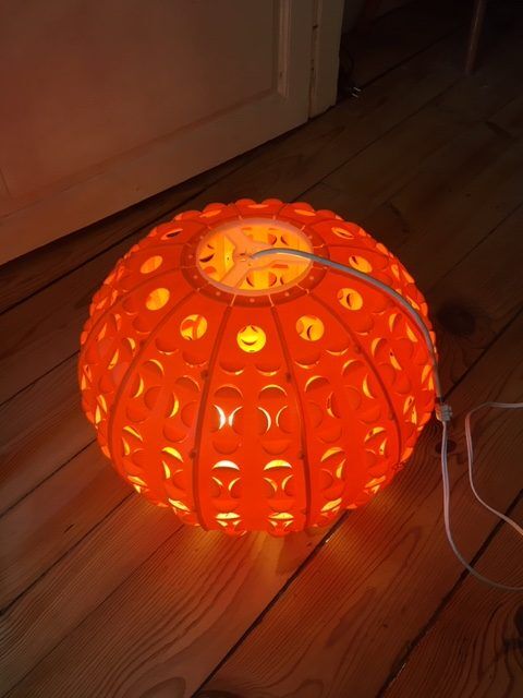 Year 70 suspension in orange plastic