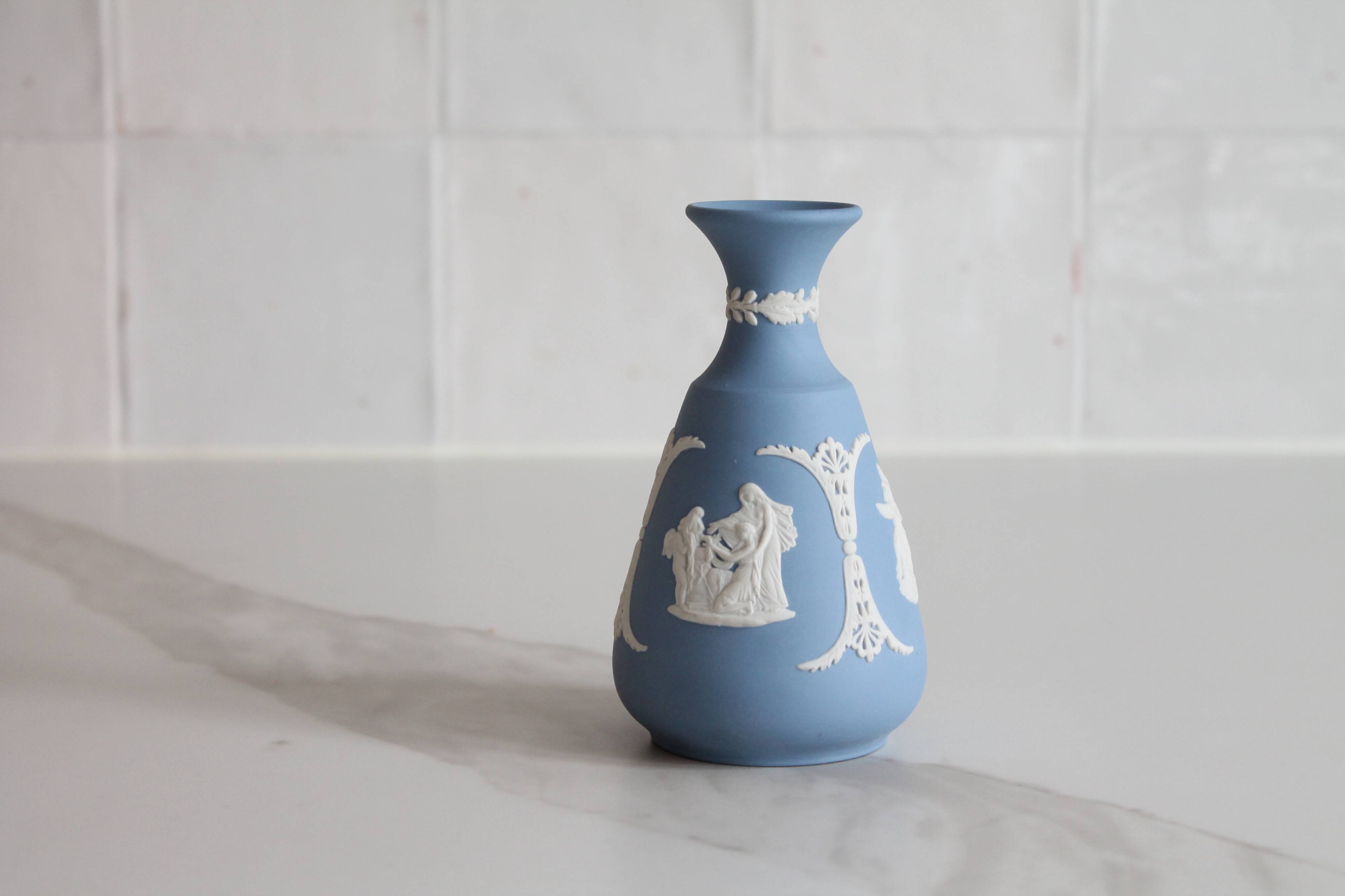 Blue porcelain vase by Wedgwood.