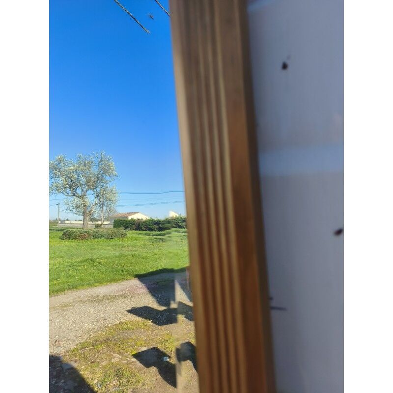 Miroir bois et stuc doré XIXe biseauté