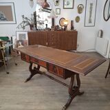 English desk in solid mahogany with lion paws. Leather top