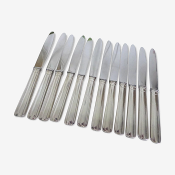 12 White metal cheese knives