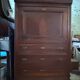 Secretary desk with mahogany and flame veneer.