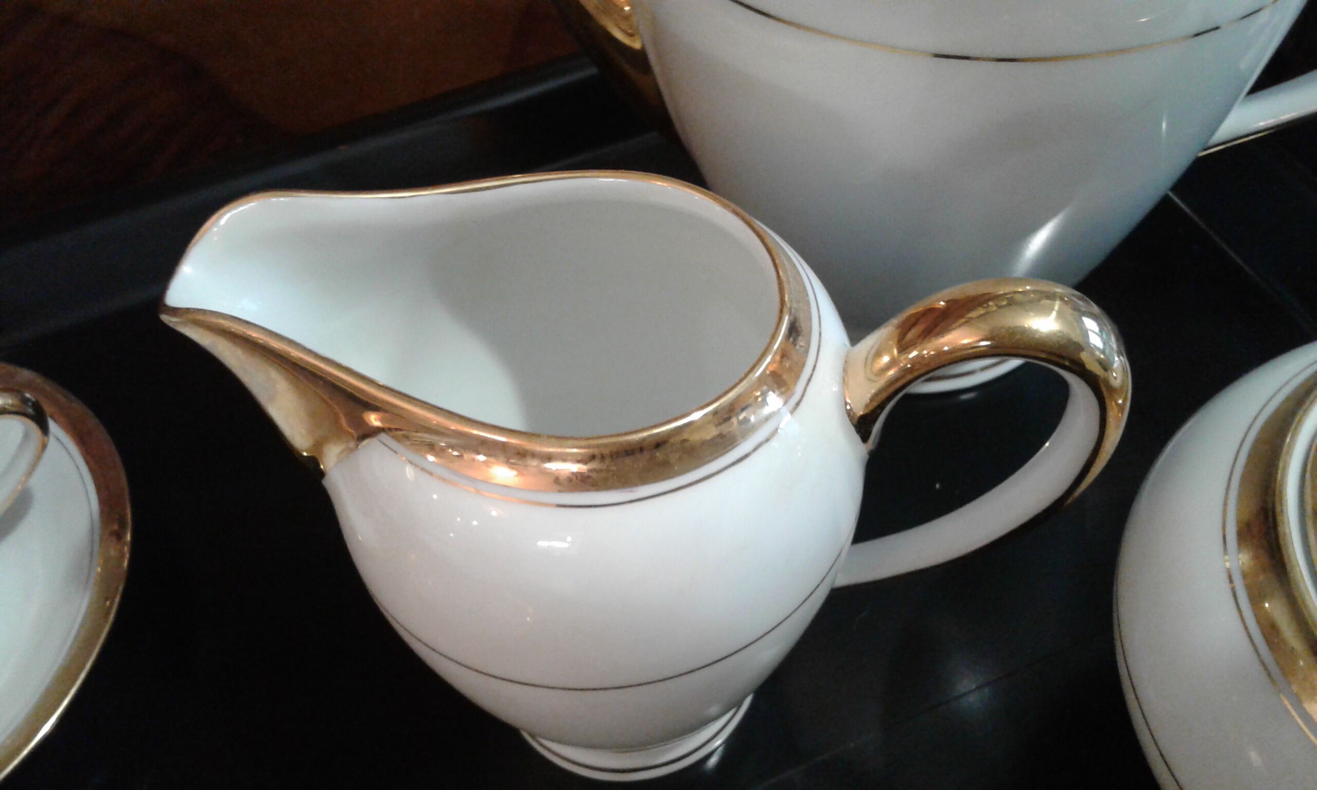 Coffee service. fine porcelain from Limoges. golden